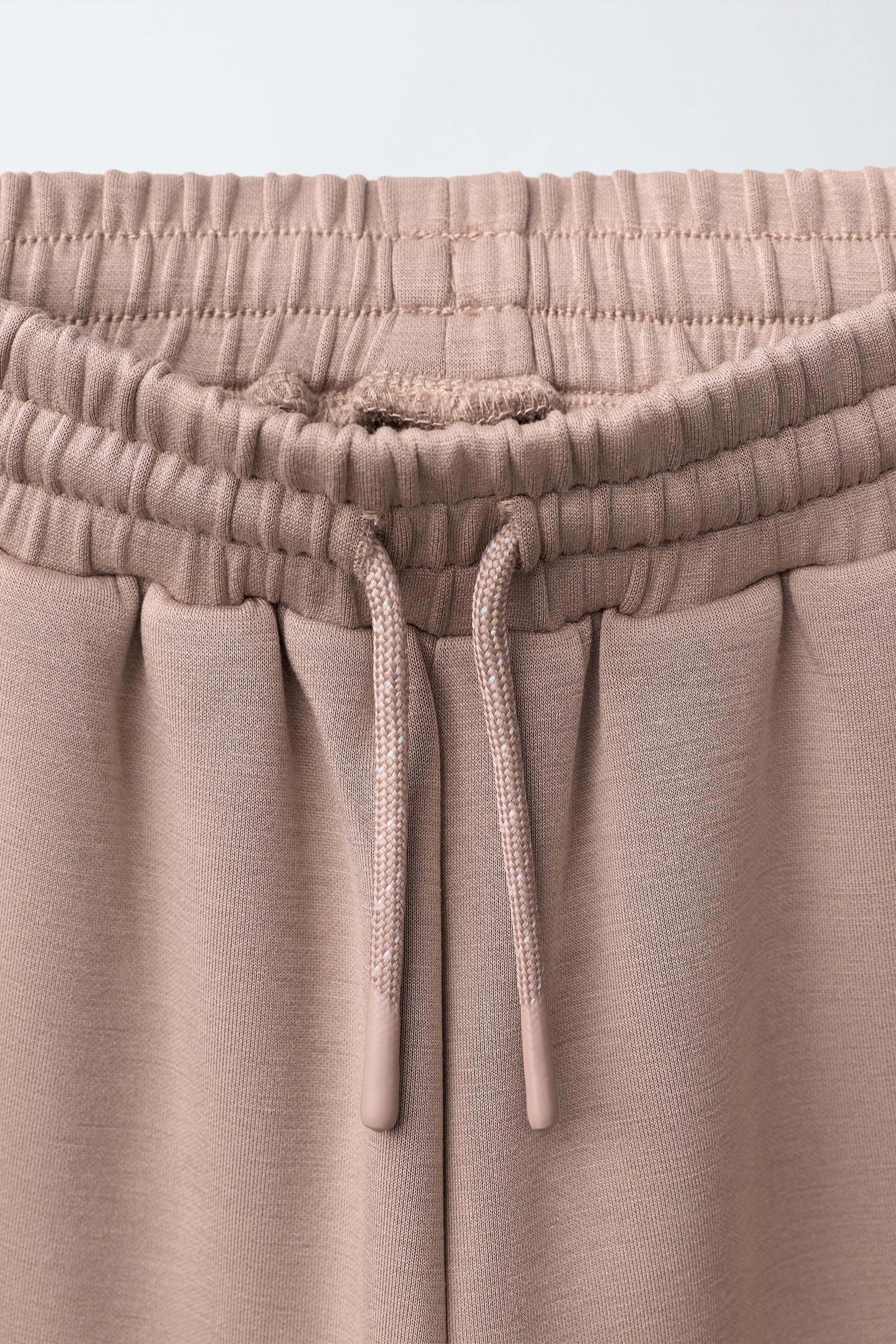 PANTALON À JAMBES LARGES SPORTIF CONTRASTE